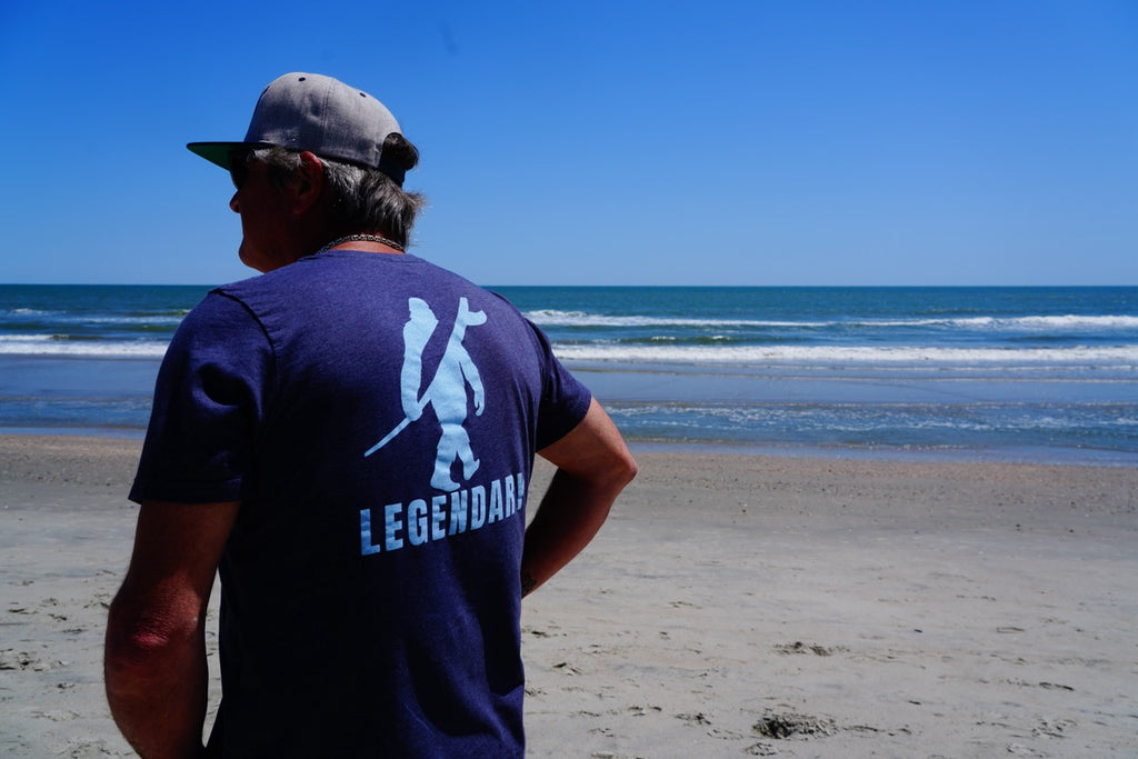 navy legendary t shirt back view beach coastal lifestyle graphic tee