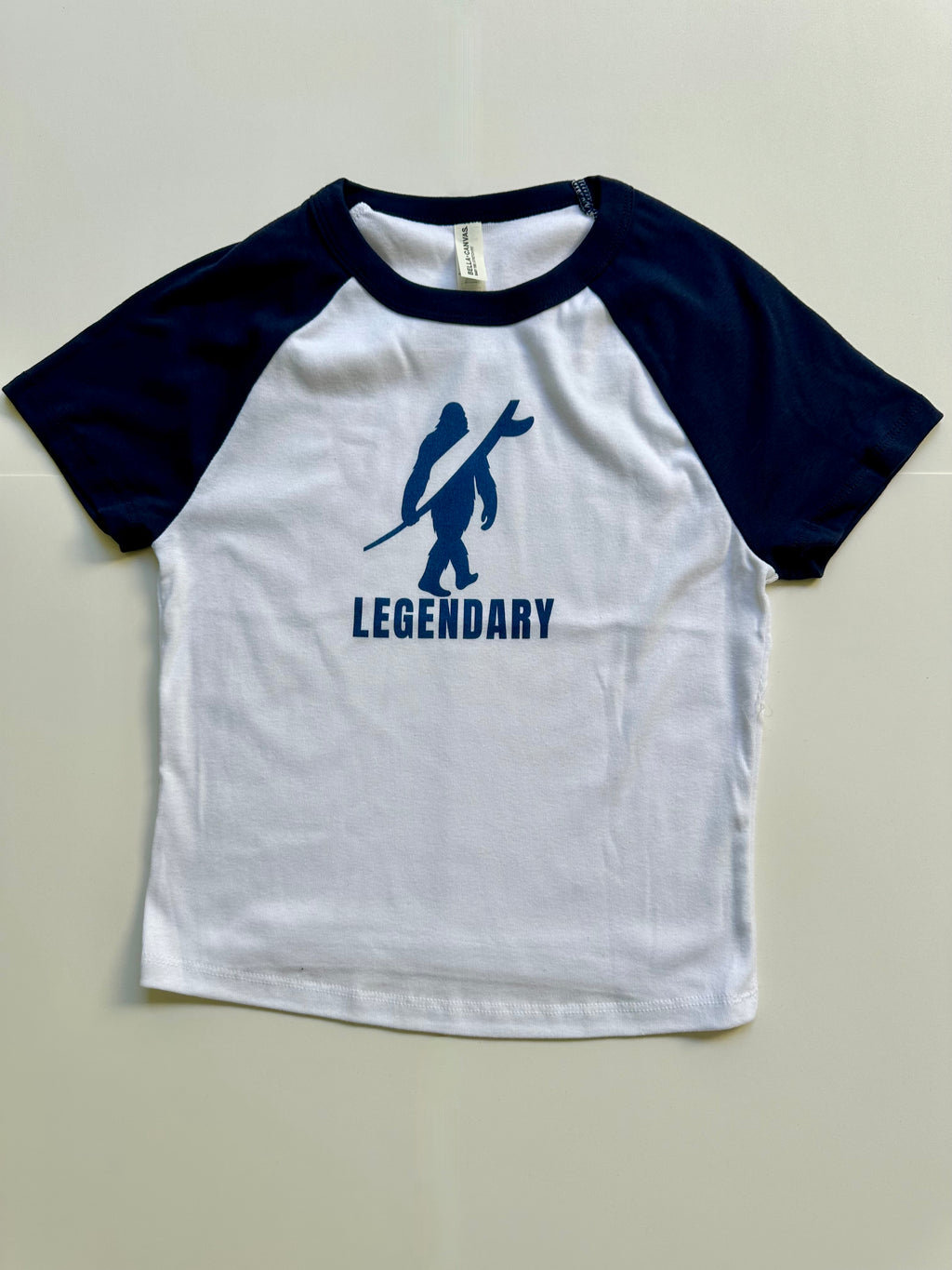 Legendary Women’s Raglan Baby Tee – Navy Blue & White